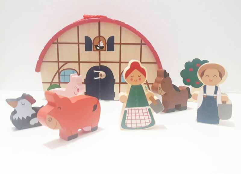 Juguetes de madera con granjeros y animales